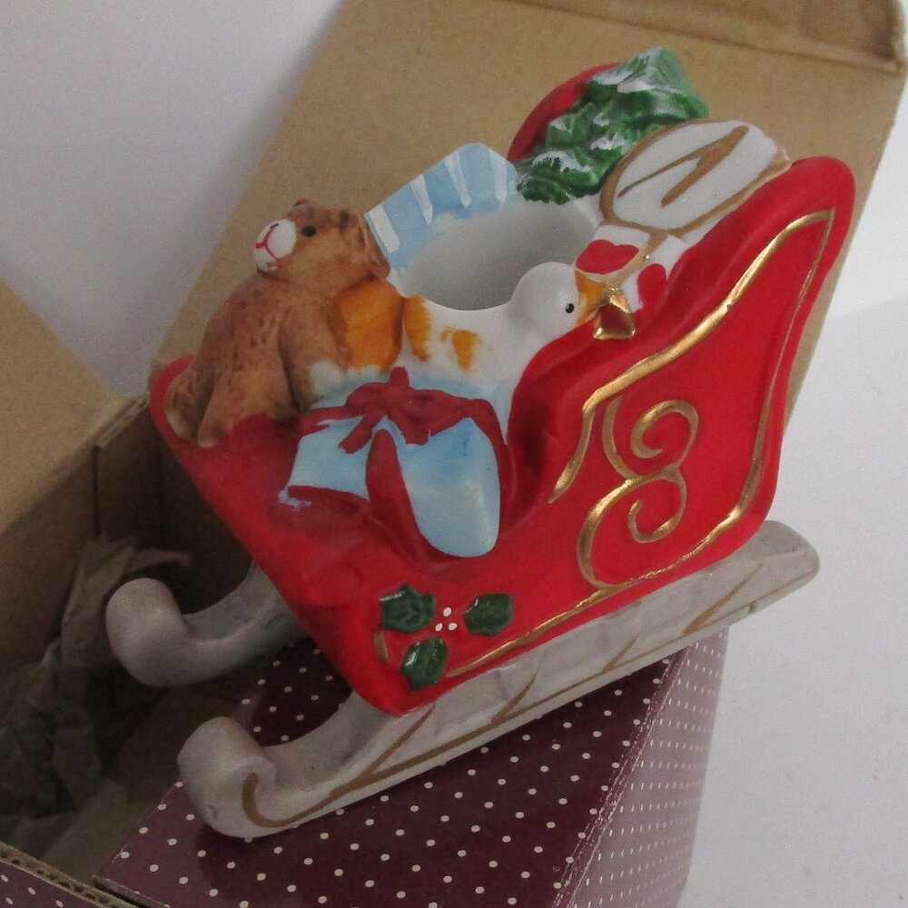 Lillian Vernon bisque sled candle holders